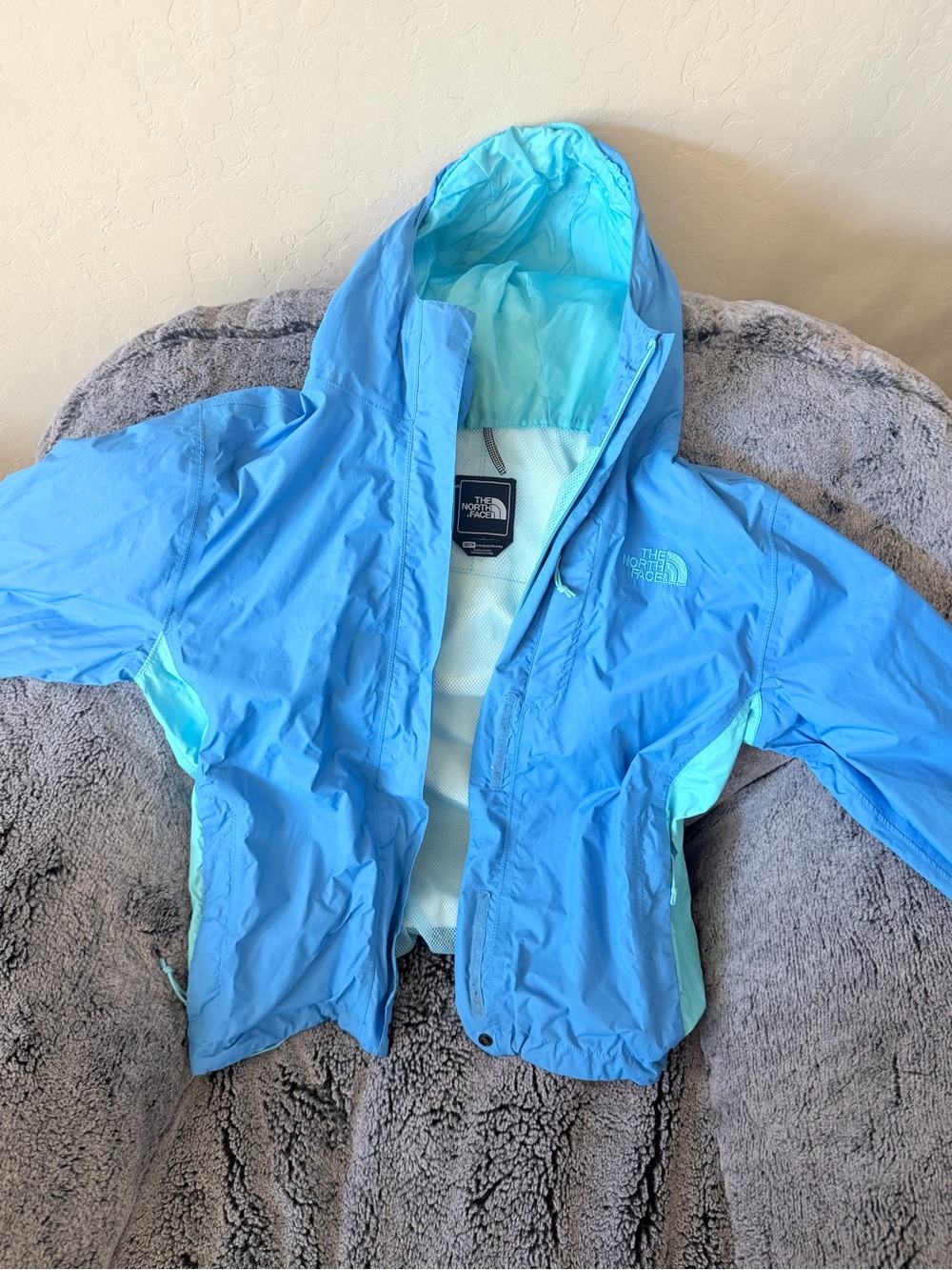 The North Face Women’s Light Blue Hooded Rain Jacket